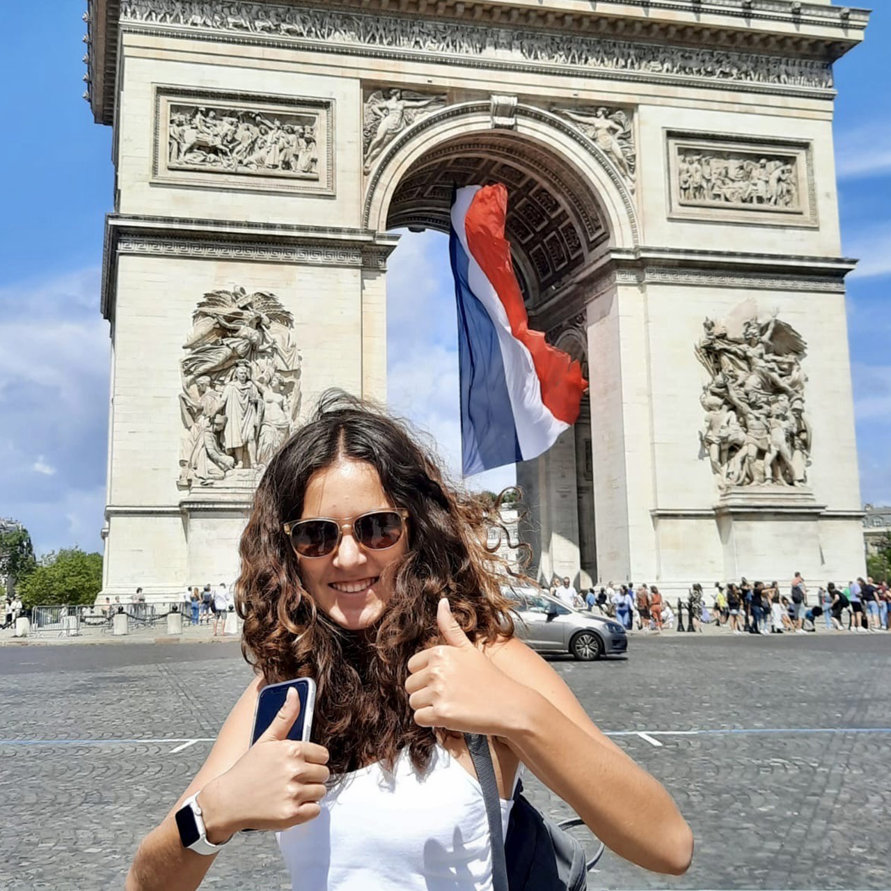 Exchange student in front of Arc de Triomphe Paris France